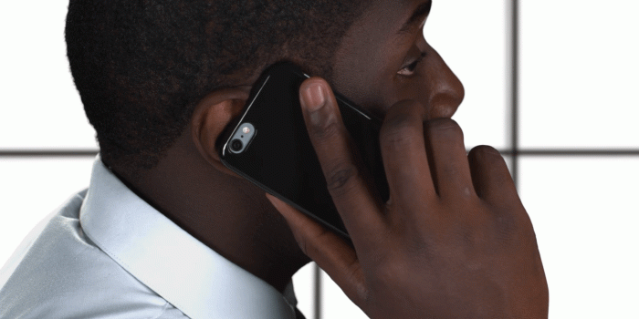 1920x1080 Phone talking on white background. Black guy holding cellphone.