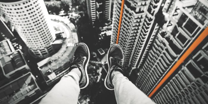 5760x3840 Pair of black-and-gray sneakers, skyscraper, legs, Nike, selective