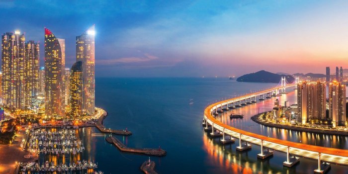 1332x850 Wallpaper sea, sunset, bridge, building, port, night city