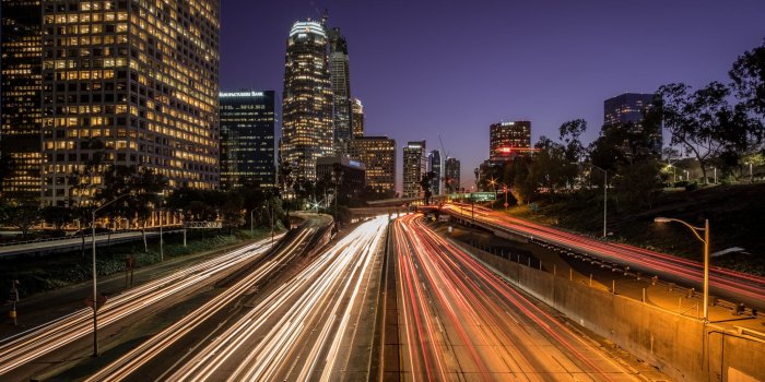 2000x1125 View of buildings with road during night time, highway 110, los