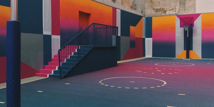 3024x4032 urban basketball court with colorful graffiti on walls and floor sen