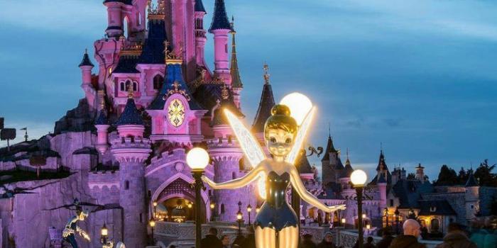 736x1102 Tinkerbell statue in front of the Sleeping Beauty Castle in