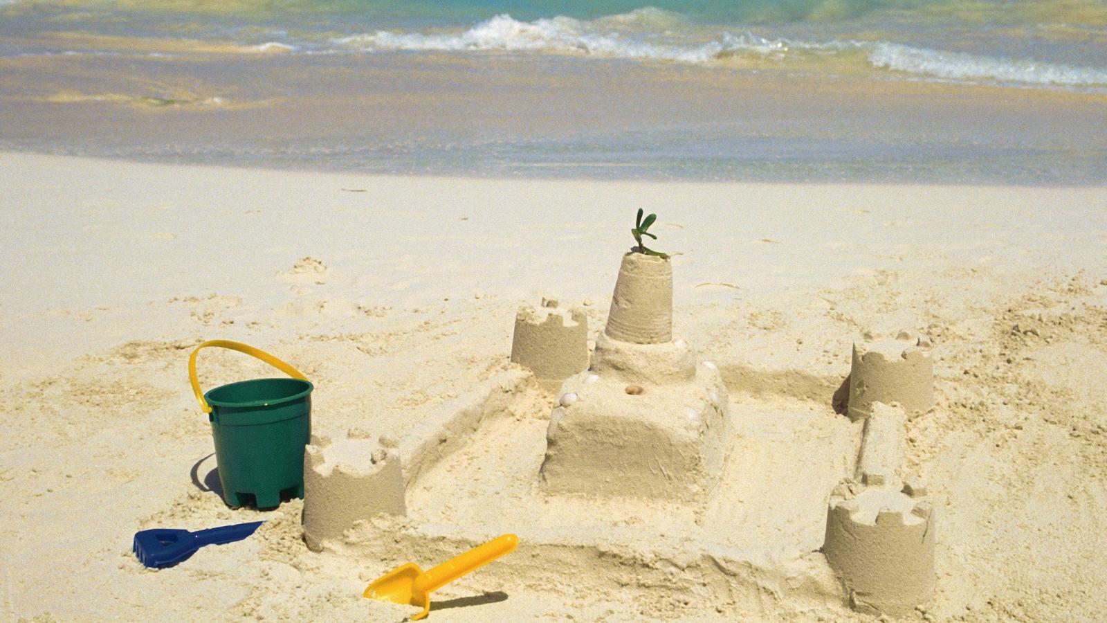 2560x1440 Download wallpaper 2560x1440 sand, castle, beach, sea widescreen 16