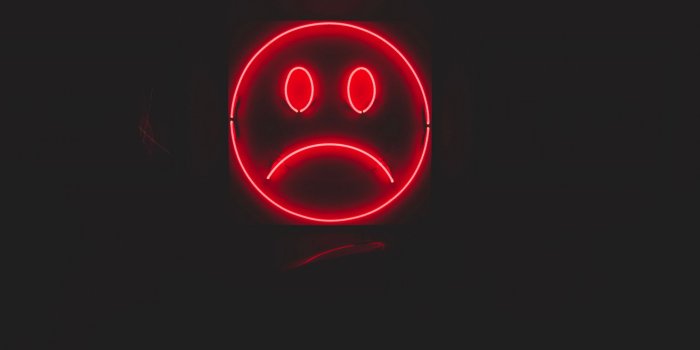 2560x1440 Download wallpaper 2560x1440 smile, smiley, sad, neon, red