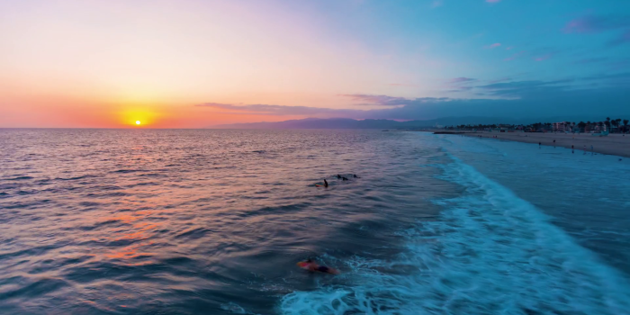 1920x1080 Sunset time-lapse of Venice Beach, California with surfers and