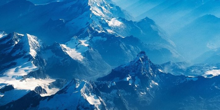 938x1668 Download wallpaper 938x1668 mountains, aerial view, clouds, fog