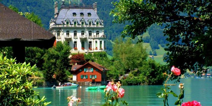 1680x1050 Green Serenity blue mountains nature flowers houses shore