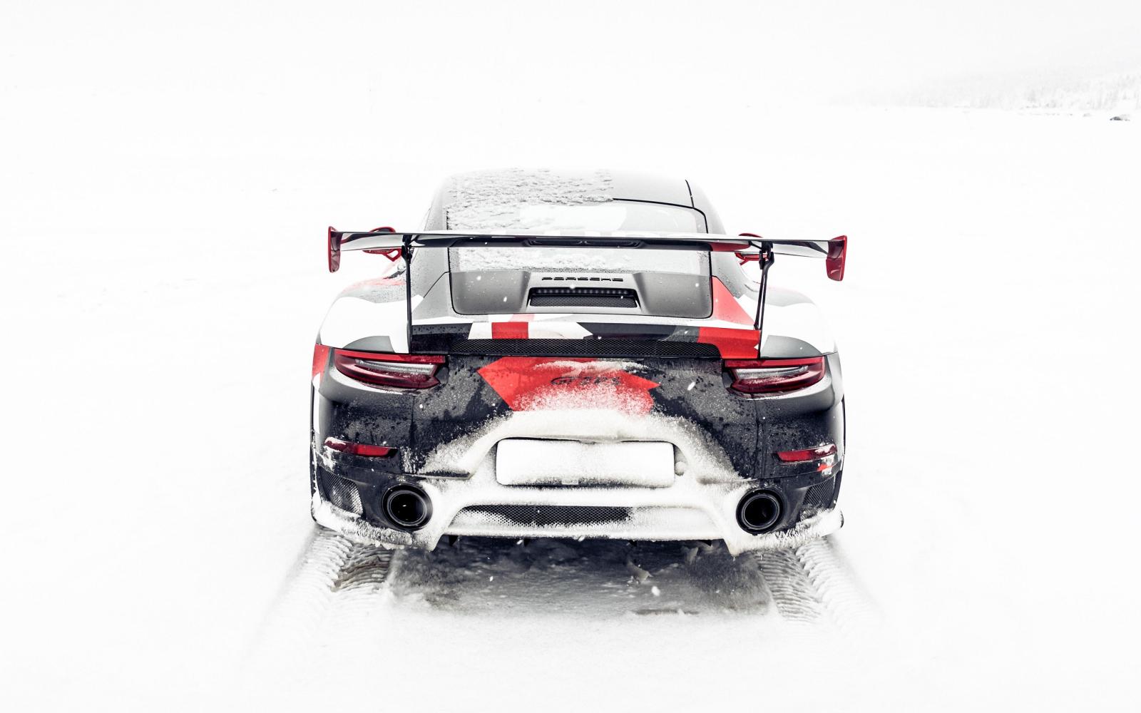 3840x2400 Download wallpaper 3840x2400 sports car, rear view, snow, winter