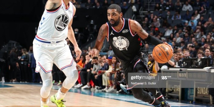 1024x768 Kyrie Irving of Team LeBron handles the ball against Stephen Curry