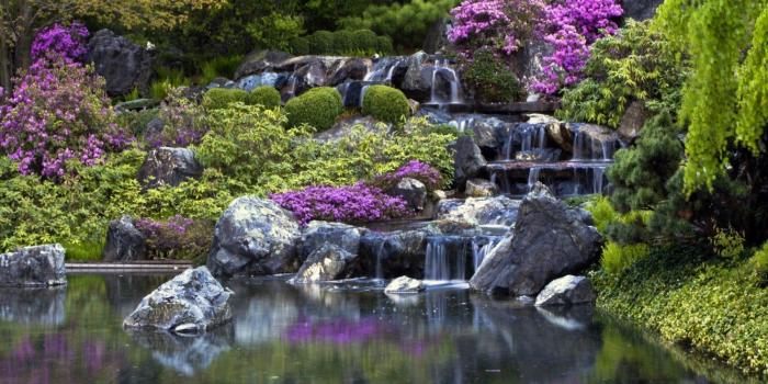 1332x1000 Wall mural wallpaper waterfall flowers trees stones photo 360 cm x