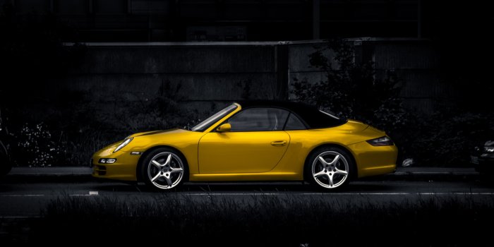 3840x2165 yellow luxury convertible with dark backgroundporsche 4k wallpaper