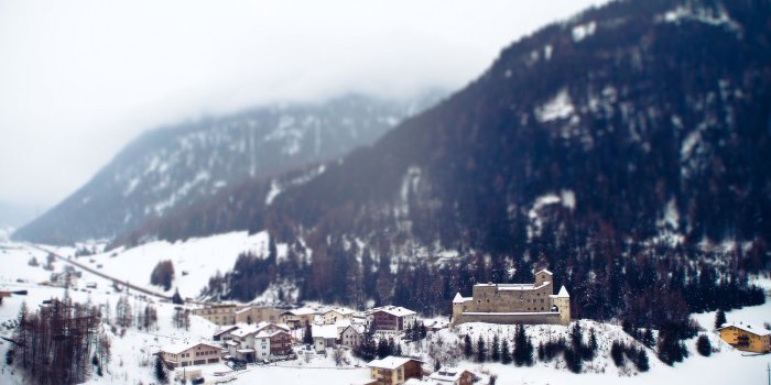 2560x1440 Download wallpaper 2560x1440 city, resort, mountains, alps, snow