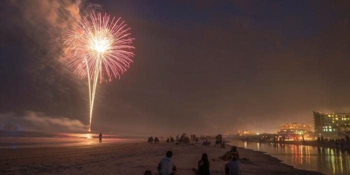 1366x768 Fireworks on the beach in Jacksonville, Florida Desktop wallpapers