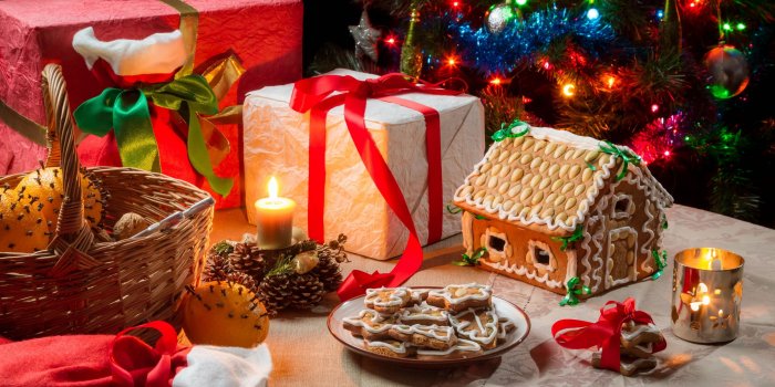 4000x2468 New Year gifts candles cookies gingerbread house basket oranges