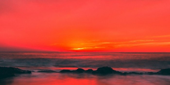 1440x2560 Download wallpaper 1440x2560 beach, sunset, sea, horizon, sky