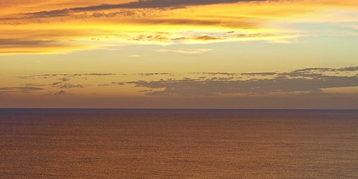 1440x2608 Download 1440x2880 wallpaper beach, sunset, calm sea, clouds, sky