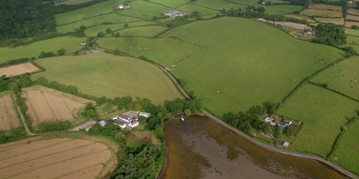 1920x1080 6K stock footage aerial video orbiting farms and farm fields