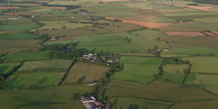 1920x1080 6K stock footage aerial video of farm fields and rural homes
