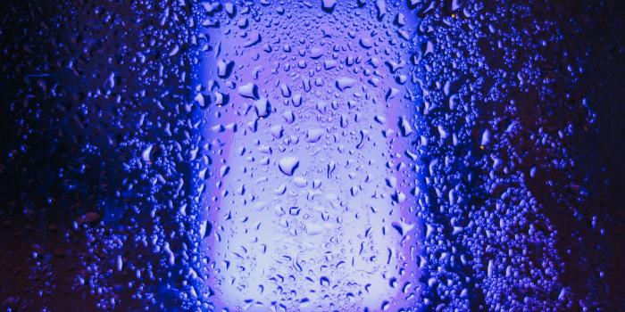 3840x2160 Download wallpaper 3840x2160 glass, wet, neon, drops, rain 4k uhd