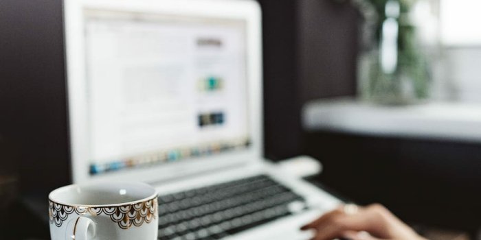 910x1365 HD wallpaper: Woman working on laptop at home office, workspace