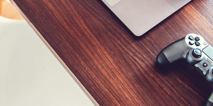 910x1365 HD wallpaper: work place, mackbook, work desk, ps4, technology