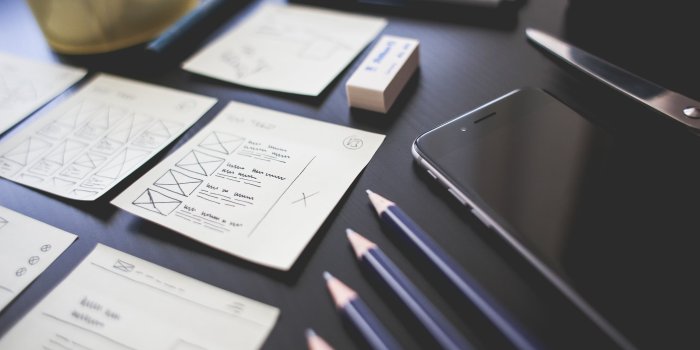 4000x2667 Space gray iPhone 6 on table with pencils, printing paper, and