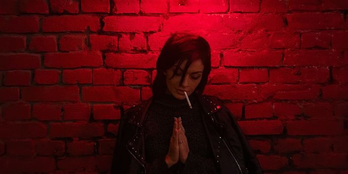 910x1213 HD wallpaper: woman doing praying hand sign under red neon light