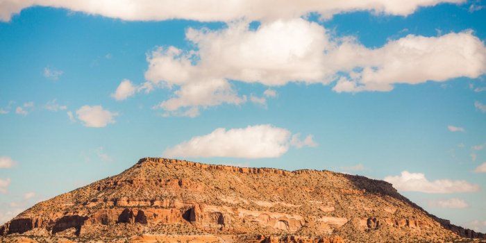 1600x900 Download wallpaper 1600x900 new mexico, desert, sky, sand