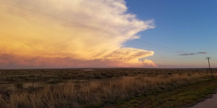 1920x1080 1920x1080] Distant hailstorm at sunset over the New Mexico desert