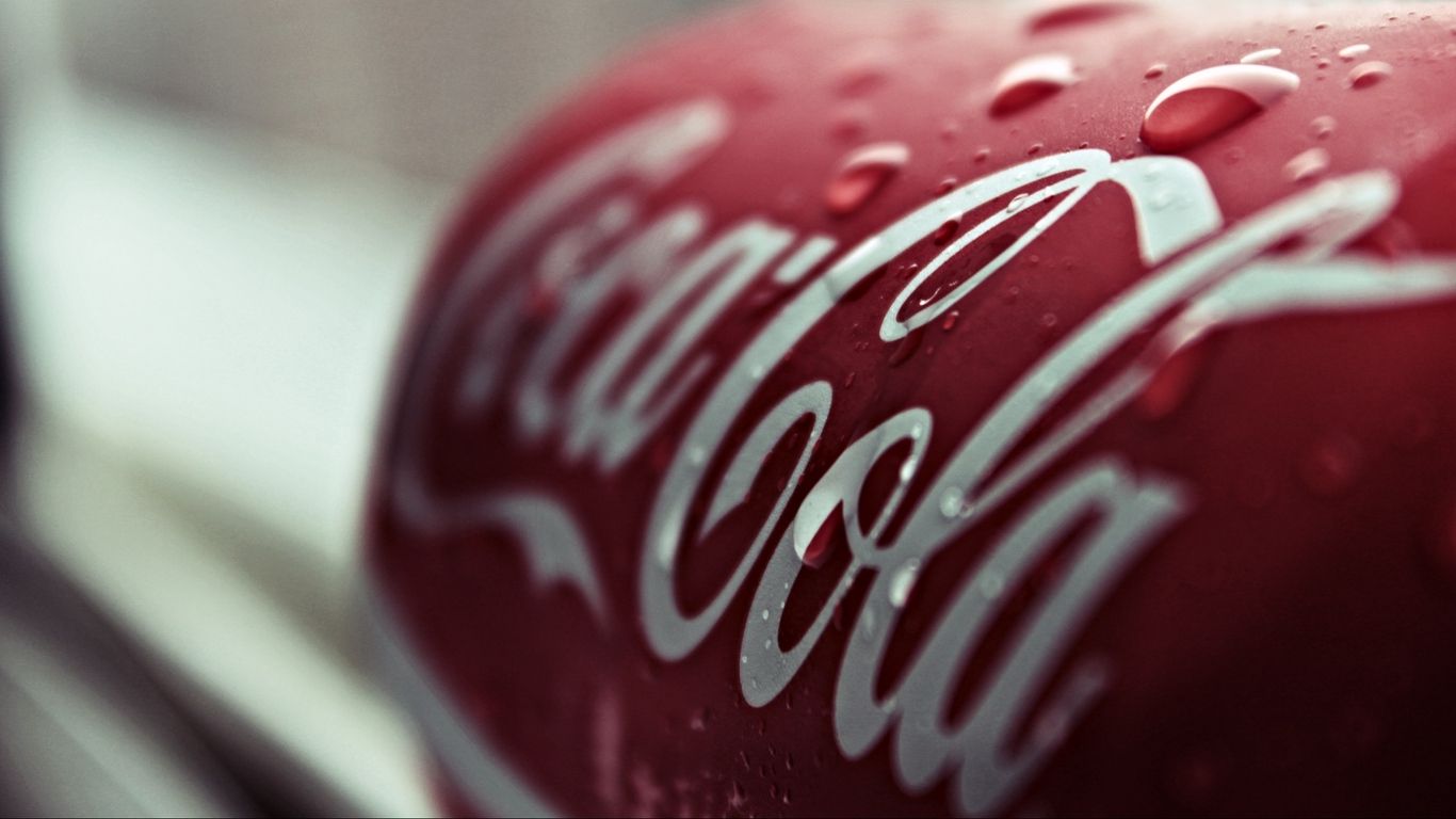 1366x768 Download wallpaper 1366x768 bank, coca cola, label, brand tablet