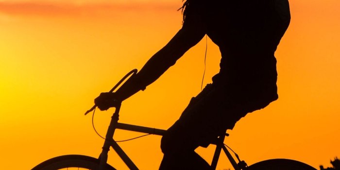 1440x2560 Download wallpaper 1440x2560 bicyclist, cyclist, silhouette