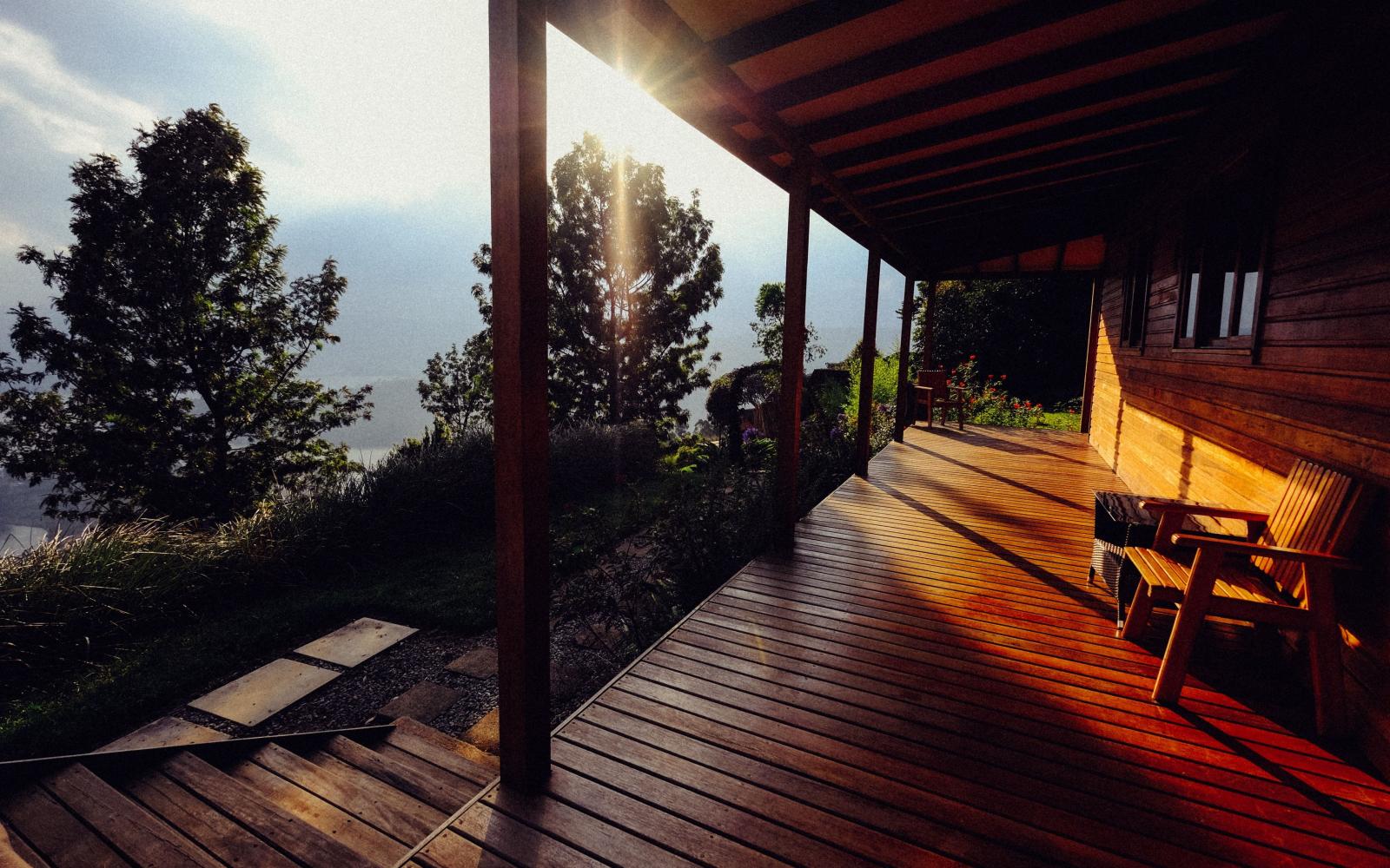 3840x2400 Download wallpaper 3840x2400 terrace, bench, sunshine, cosiness 4k