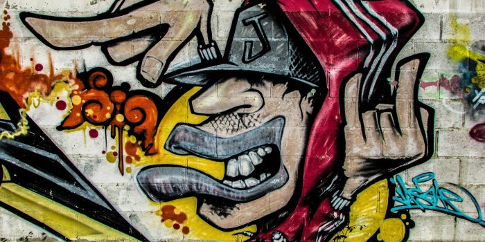 4511x2537 man in red hoodie graffiti art free image | Peakpx