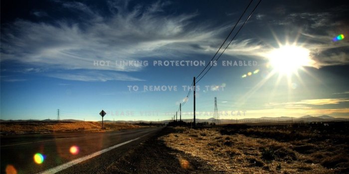 1920x1080 midday sun over highway through the prairie