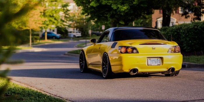2560x1080 Download wallpaper 2560x1080 honda s2000, honda, sunlight, yellow