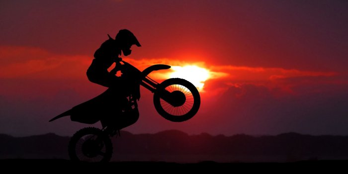 1920x1080 Download wallpaper: Biker on motorcycle at sunrise 1920x1080