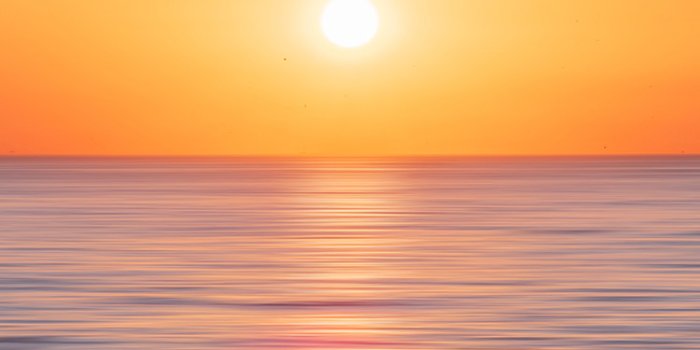 750x1334 od33-nature-sun-sunset-sea-sky-ocean-wallpaper
