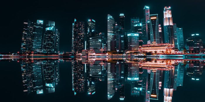 2560x1600 lighted buildings during night time Mac Wallpaper Download | AllMacWallpaper
