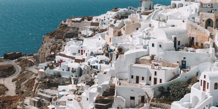 1242x2688 Santorini Greece during daytime iPhone X Wallpapers Free Download