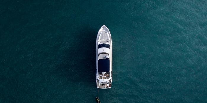 1000x1250 aerial photography of white yacht on calm waters photo – Free Luxury Image  on Unsplash