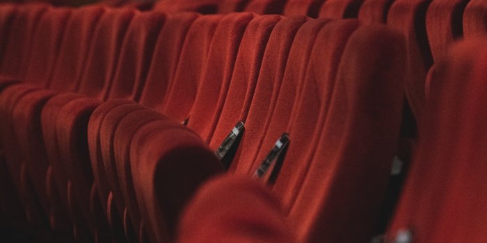 1000x1781 red fabric padded cinema chairs photo – Free Brown Image on Unsplash