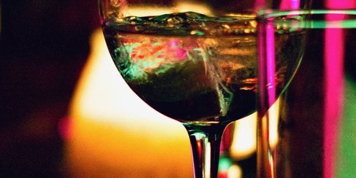 828x1792 half filled wine glass beside half empty clear pin... iPhone 11 Wallpapers  Free Download