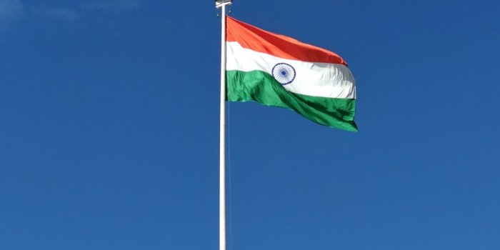 1000x1249 red white and green flag under blue sky during daytime photo – Free Image  on Unsplash