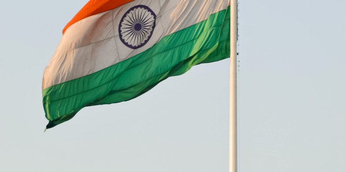 2949x4423 Waving Flag Under the Blue Sky · Free Stock Photo