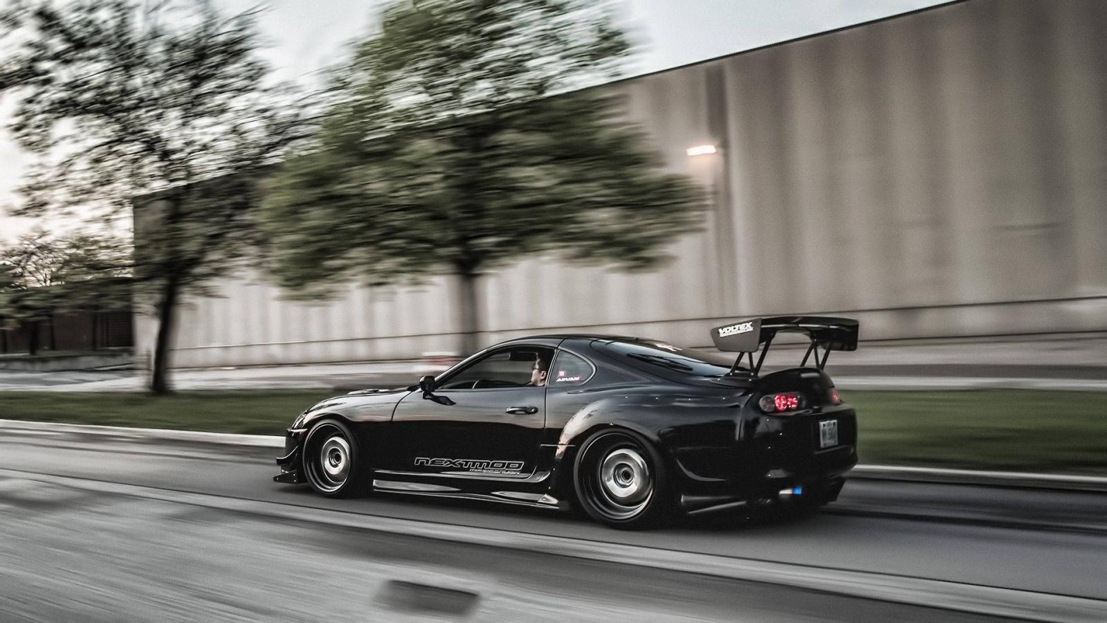 1920x1080 Download Fast Moving Black Toyota Supra Wallpaper | Wallpapers.com