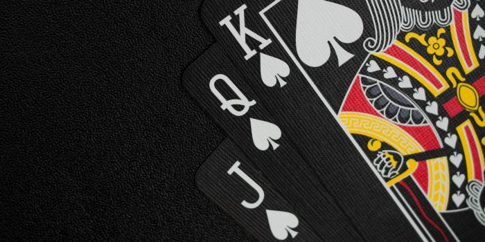 3733x4977 Black Playing Cards on Black Background · Free Stock Photo