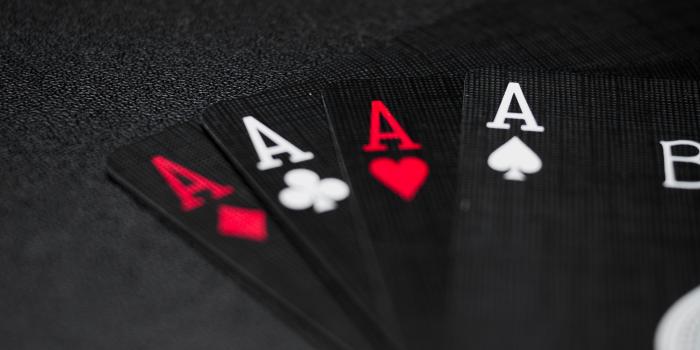 4000x5333 Black Playing Cards on Black Background · Free Stock Photo
