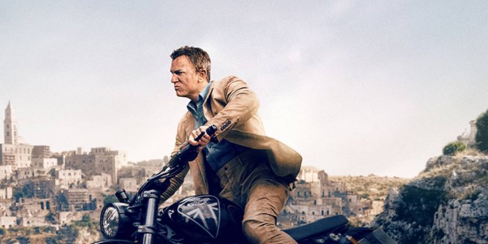 1287x1920 Download No Time To Die James Bond Riding Motorcycle Wallpaper | Wallpapers .com