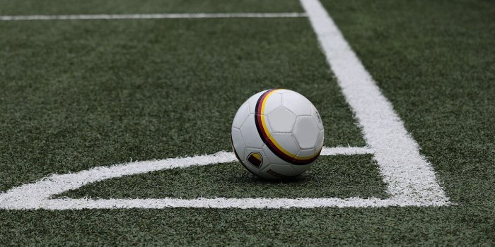 1366x768 Download wallpaper 1366x768 football, soccer ball, lawn, marking tablet,  laptop hd background