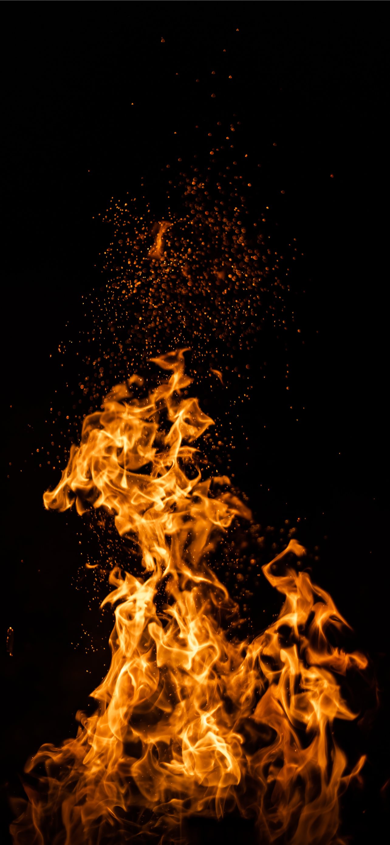 1284x2778 fire in the sky during night time iPhone Wallpapers Free Download